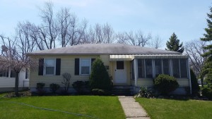 Before Roof Cleaning in West Seneca, New York by Carolina Clean.
